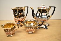 An early 20th-century Lingard Webster and Company ceramic Imari-style part tea set, featuring hand