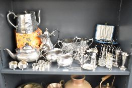 A large quantity of 20th-century metal and silver plated tableware, including selection of tea pots,
