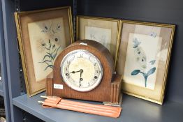 A vintage James Walker Ltd mantel clock sold alongside three framed botanical prints etc.