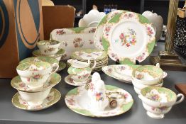 A Paragon china 'Honiton Green' and a Paragon china 'Rockingham' pattern part dinner/tea services,