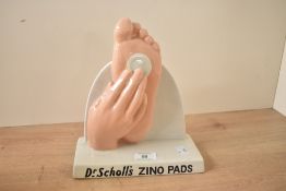 An early 20th-century Royal Doulton ceramic Dr. Scholls chemist advertising display for Zino Pads,