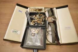 An assortment of costume jewellery, including a vintage marcasite floral scroll necklace, a Radley