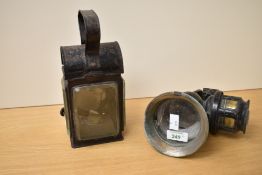 A vintage carbide motorcycle lamp, of traditional design, sold together with a John Phillips light