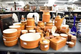 A large quantity of 20th century Hornsea pottery 'Saffron' pattern items to include coffee pot, jars