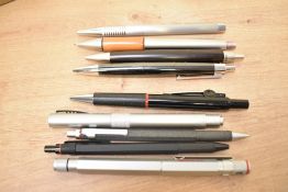 Five Rotring pens. A Rotring 600 cartridge fill fountain pen three ballpoint pens and a propelling