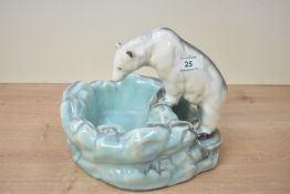 An early 20th century Czechoslovakian ceramic polar bear ashtray receptacle, designed by Ditmar