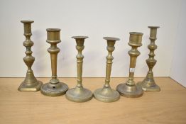 A quantity of late 19th to early 20th-century brass chamber sticks, unmarked, (3 sets of two, 6
