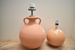 A vintage ceramic table lamp having peach swirl crackle glaze sold together with a larger modern