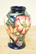 A contemporary Moorcroft pottery 'Golden Jubilee' vase, designed by Emma Bossons in 2001, of slender