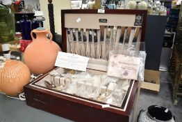 An 'Arthur Price Of England' mahogany canteen of silver-plated cutlery, measuring 46cm x 32cm x