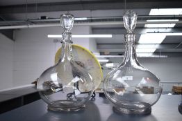 Two large 19th century hand blown glass apothecary carboys with stoppers, unmarked, 40cm.