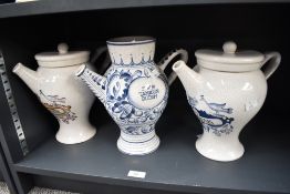Three 20th-century ceramic crackle glaze apothecary syrup jars, featuring transferware or hand-