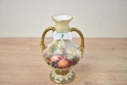 A Victorian Royal Worcester porcelain blush ivory vase, of bulbous form with twin gilded handles,