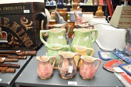 A selection of eleven 20th-century Govancroft Pottery, Glasgow, glazed stoneware jugs, to include