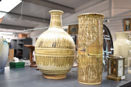 A large studio pottery vase having striped design measuring 36cm tall sold together with a