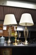 A selection of three modern table lamps, including a pair of Dar ‘Bybliss’ lamps in a satin chrome