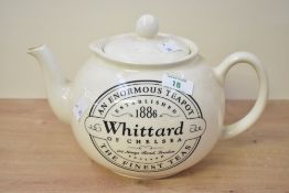 A large modern Whittard of Chelsea ceramic teapot, of traditional globular form with shaped spout