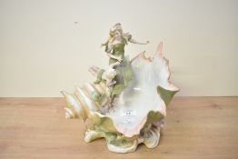 A large 20th-century Art Nouveau Royal Dux-style porcelain centrepiece, depicting a woman and