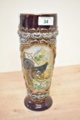 A Victorian King Austria ceramic black grouse vase, modelled with a raised relief of a tertiary