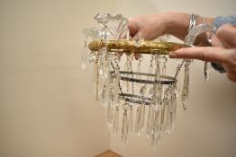 An early 20th-century gilt, two-tier, crystal-cut glass icicle droplet chandelier, unmarked, 21 cm