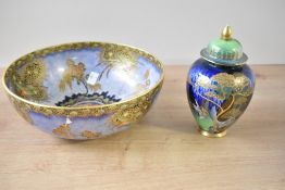 Two 20th-century Carlton Ware pottery items, including an Art Deco-style Paradise Bird and Tree bowl