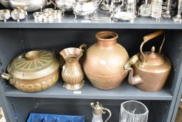 Five late 19th to early 20th century copperware items, including a large kettle, two hand-hammered