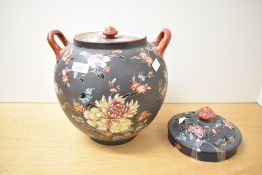 A Victorian English porcelain black basalt pot pourri, decorated in the Chinese Famille Noire