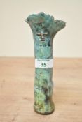 A late 20th century studio pottery bud vase, of celery-like form with a whimsical face, decorated in