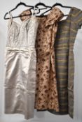 Three 20th century vintage cocktail dresses, comprising a pure silk Marcusa by Marcus in taupe and