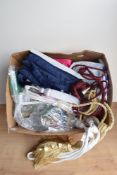 A large quantity of upholstery trimmings, edging, cording, webbing and ribbon, along with ready made
