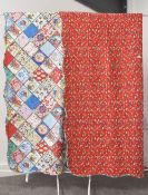 A Vintage Maison cotton bedspread and matching throw cushion in vibrant red ,blue and yellows floral