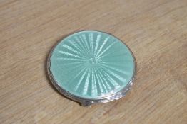 A 1930s silver and Guilloche enamel compact, hallmarked Crisford & Norris Ltd., Birmingham 1935,
