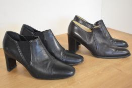 Two pairs of 1990s leather heeled shoe-boots, a black St Michael pair with elastic panels, size 6.5,