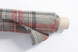 A bolt of Abraham Moon & Sons 100% pure wool in Beningbrough Willow colour way, having a light