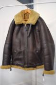 A 20th century vintage Irvin RAF Aviation Flying Jacket, dark brown leather with caramel inner