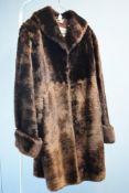 A vintage St. Marks of Birmingham fur coat, in the chocolate brown 'teddy bear fur' style popular in