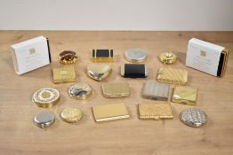 Assorted makeup and powder compacts in gilt or white metal, to include Estee Lauder collectible