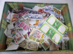 WORLDWIDE OFF PAPER STAMP COLLECTION IN SHOEBOX - SEVERAL THOUSAND STAMPS Shoe box with off paper