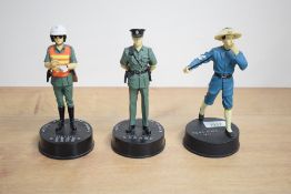 A group of three painted cast-resin Hong Kong related figures 'Hong Kong 1844' 'Royal Hong Kong
