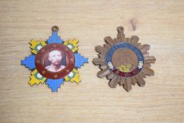 Two Chinese republic military medals, a star-shaped life saving medal featuring a photographic image