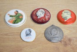 A group of five Chinese Maoist/cultural revolution badges, two being ceramic, one base metal and two