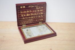 Two interesting insect fossil specimens housed within a Chinese red-stained hardwood book-form