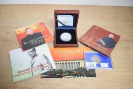 A Chinese commemorative 1oz silver coin, produced for the 100th anniversary of the Xinhai