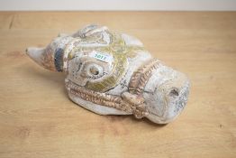 A decorative Chinese carved and painted wooden mule head, having applied wall suspension loop verso,