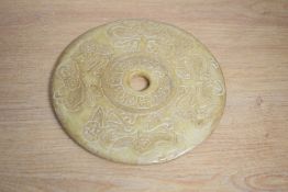 A decorative Chinese carved and pierced mottled stone Bi/Yubi type Disc, of circular form with
