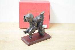 A 20th century Chinese cast and patinated bronze figure group, formed as two young children, the boy