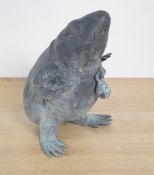 An unusual Chinese cast and patinated brass frog study, modelled standing on rear legs with collar