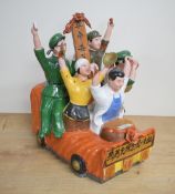 A Chinese Cultural Revolution/Maoist part glazed bisque porcelain figure group, formed as five