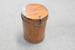 A Chinese iron-bound elm rice or grain barrel, of cylindrical form with hasped cover, 43cm x 30cm