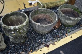 Three concrete planters of classical form